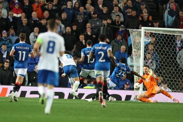 Hyeongyu Oh of Genk scores past Rangers goalkeeper Jack Butland during the Europa League league phase match at Ibrox Stadium, Glasgow. Rangers v Genk - UEFA Europa League - League Phase - Ibrox Stadium, Glasgow, Lanarkshire, Scotland, UK - 25 Sep 2025Glasgow Ibrox Lanarkshire United Kingdom  Copyright: xO Rourke RangersxFC Shutterstockx 15504270ab