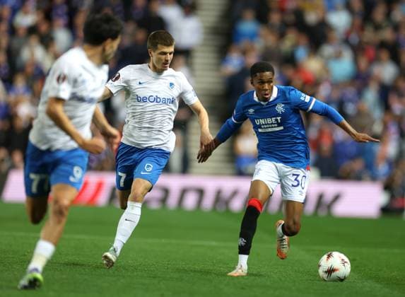 Jarne Steuckers of Genk and Jayden Meghoma of Rangers during the Europa League league phase match at Ibrox Stadium, Glasgow. Rangers v Genk - UEFA Europa League - League Phase - Ibrox Stadium, Glasgow, Lanarkshire, Scotland, UK - 25 Sep 2025Glasgow Ibrox Lanarkshire United Kingdom  Copyright: xO Rourke RangersxFC Shutterstockx 15504270as