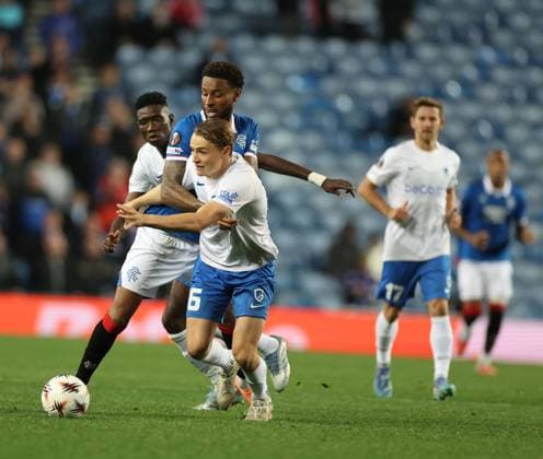 Youssef Chermiti of Rangers battles for the ball with Matte Smets of Genk during the Europa League league phase match at Ibrox Stadium, Glasgow. Rangers v Genk - UEFA Europa League - League Phase - Ibrox Stadium, Glasgow, Lanarkshire, Scotland, UK - 25 Sep 2025Glasgow Ibrox Lanarkshire United Kingdom  Copyright: xO Rourke RangersxFC Shutterstockx 15504270cb