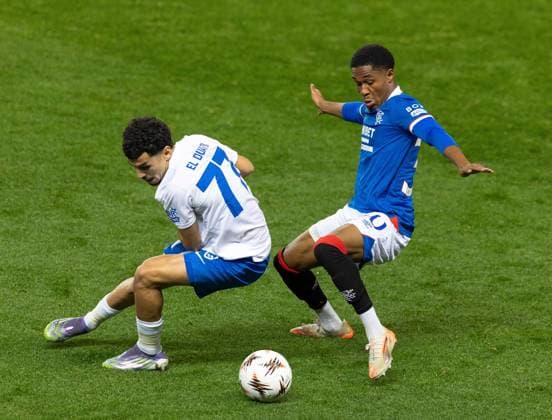 Jayden Meghoma of Rangers in action with Zakaria El Ouahdi of KRC Genk during UEFA Europa League league phase match at Ibrox Stadium, Glasgow. Rangers v KRC Genk - UEFA Europa League - Ibrox Stadium, Glasgow, Lanarkshire, Scotland, UK - 25 Sep 2025Glasgow Ibrox Stadium Lanarkshire, Scotland United Kingdom EDITORIAL USE ONLY  Copyright: xRangersxFC Shutterstockx 15504638ar