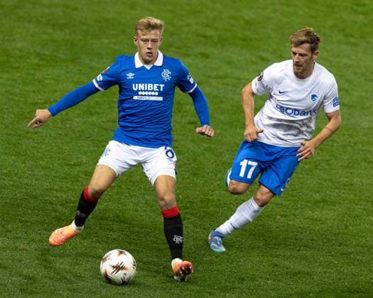 Connor Barron of Rangers in action with Patrik Hrosovsky of KRC Genk during UEFA Europa League league phase match at Ibrox Stadium, Glasgow. Rangers v KRC Genk - UEFA Europa League - Ibrox Stadium, Glasgow, Lanarkshire, Scotland, UK - 25 Sep 2025Glasgow Ibrox Stadium Lanarkshire, Scotland United Kingdom EDITORIAL USE ONLY  Copyright: xRangersxFC Shutterstockx 15504638bm
