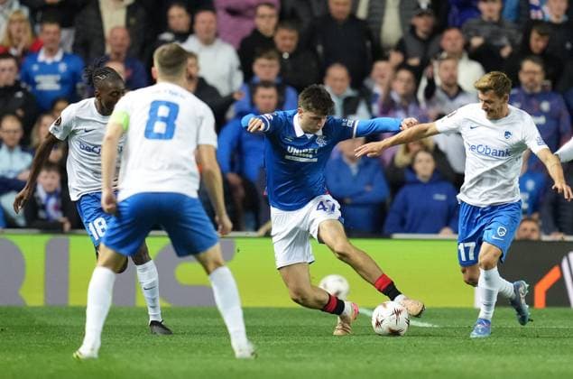 Mikey Moore of Rangers between Joris Kayembe & Partik Hrosovsky of Genk. Rangers v Genk, UEFA Europa League, Football, Ibrox Stadium, Glasgow, Scotland, UK - 25 Sep 2025Glasgow Ibrox Stadium Scotland United Kingdom EDITORIAL USE ONLY No use with unauthorised audio, video, data, fixture lists, club league logos or live services. Online in-match use limited to 120 images, no video emulation. No use in betting, games or single club league player publications. Copyright: xStuartxWallace Shutterstockx 15498613cd