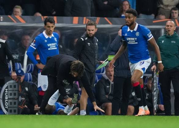 Joris Kayembe of Genk collides with Rangers Manager Russell Martin after a challenge from Youssef Chermiti of Rangers, knocking Rangers Manager Russell Martin to the ground in the technical area. Rangers v Genk, UEFA Europa League, Football, Ibrox Stadium, Glasgow, Scotland, UK - 25 Sep 2025Glasgow Ibrox Stadium Scotland United Kingdom EDITORIAL USE ONLY No use with unauthorised audio, video, data, fixture lists, club league logos or live services. Online in-match use limited to 120 images, no video emulation. No use in betting, games or single club league player publications. Copyright: xStuartxWallace Shutterstockx 15498613ck
