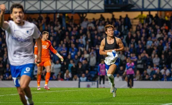 25th September 2025; Ibrox Stadium, Glasgow, Scotland; UEFA Europa League Football, Rangers versus Genk; Oh Hyeon gyu of KRC Genk celebrates after he shoots and scores past Jack Butland of Rangers in the 55th minute to make it 1-0  VagelisxGeorgariou