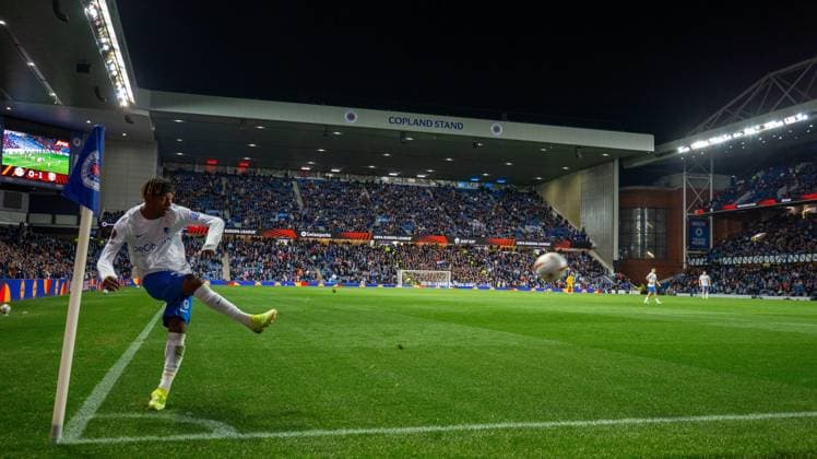 25th September 2025; Ibrox Stadium, Glasgow, Scotland; UEFA Europa League Football, Rangers versus Genk; Noah Adedeji Sternberg of KRC Genk plays a corner kick into the box  VagelisxGeorgariou