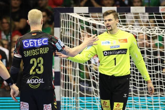 25 09 2025, xtgx, Handball, EHF Champions League, SC Magdeburg Wisla Plock v l Magnus Saugstrup Magdeburg, 23 , Sergey Hernandez Ferrer Magdeburg, 1 Celebrating the victory, cheering after the end of the game Magdeubrg