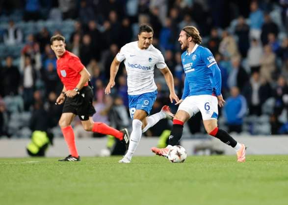 Rangers v KRC Genk UEFA Europa League Jusef Erabi of KRC Genk (left) and Joe Rothwell of Rangers in action during the UEFA Europa League match at Ibrox Stadium, Glasgow UK Newspapers OUT Copyright: xFredxPalmerx FIL-22274-0127