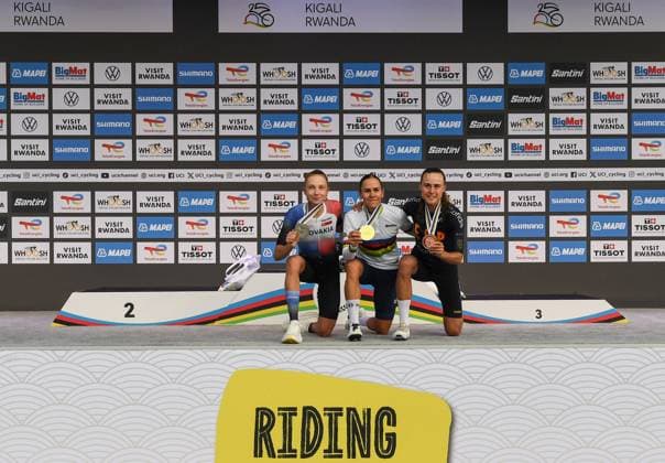 (250926) -- KIGALI, Sept. 26, 2025 -- Gold medalist Celia Gery (C) of France, silver medaslit Viktoria Chladonova (L) of Slovakia and bronze medalist Paula Blasi Cairol of Spain pose during the awarding ceremony for the Women s Under 23 (U23) Individual Time Trial of the 2025 UCI Road World Championships in Kigali, Rwanda, on Sept. 25, 2025. ) (SP)RWANDA-KIGALI-CYCLING-UCI-ROAD WORLD CHAMPIONSHIPS-WOMEN S U23 LixYahui 