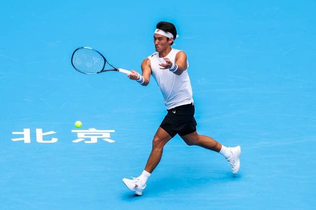 BEIJING, CHINA - SEPTEMBER 26: Yunchaokete Bu of China competes in the Men s Singles Round of 32 match against Alex De Minaur of Australia on day 5 of the 2025 China Open at National Tennis Center on September 26, 2025 in Beijing, China.  Copyright: xVCGx 111593329891