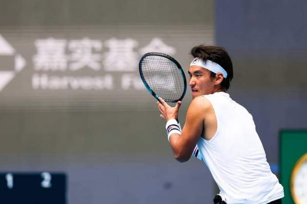 BEIJING, CHINA - SEPTEMBER 26: Yunchaokete Bu of China competes in the Men s Singles Round of 32 match against Alex De Minaur of Australia on day 5 of the 2025 China Open at National Tennis Center on September 26, 2025 in Beijing, China.  Copyright: xVCGx 111593322411