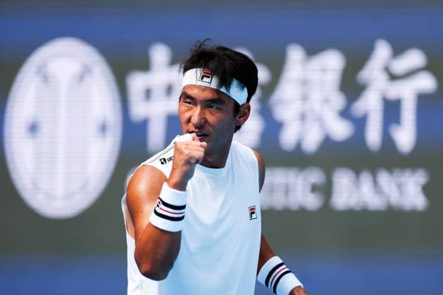 BEIJING, CHINA - SEPTEMBER 26: Yunchaokete Bu of China reacts in the Men s Singles Round of 32 match against Alex De Minaur of Australia on day 5 of the 2025 China Open at National Tennis Center on September 26, 2025 in Beijing, China.  Copyright: xVCGx 111593321119