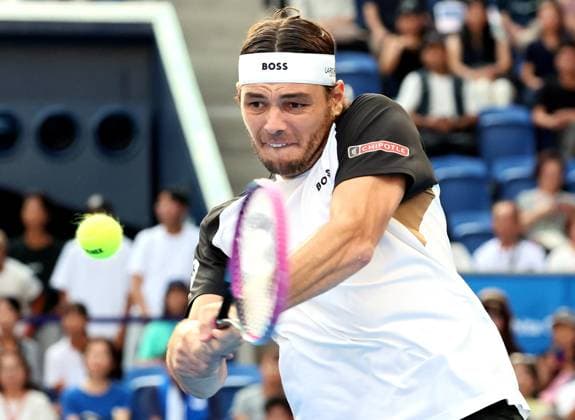 September 25, 2025, Tokyo, Japan - Taylor Fritz of the United States returns the ball against Nuno Borges of Portugal during a second round match of the Japan Open Tennis tournament in Tokyo on Friday, September 26, 2025. Fritz defeated Borges 7-5, 7-6. (photo by Yoshio Tsunoda AFLO) Noxthirdxpartyxsales  aflo_304826829