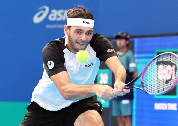 September 25, 2025, Tokyo, Japan - Taylor Fritz of the United States returns the ball against Nuno Borges of Portugal during a second round match of the Japan Open Tennis tournament in Tokyo on Friday, September 26, 2025. Fritz defeated Borges 7-5, 7-6. (photo by Yoshio Tsunoda AFLO) Noxthirdxpartyxsales  aflo_304826830