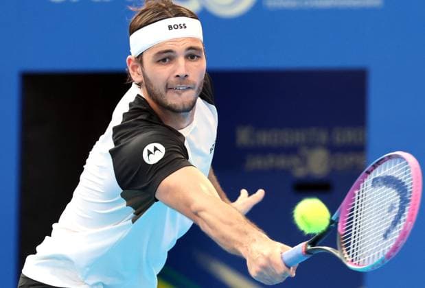 September 25, 2025, Tokyo, Japan - Taylor Fritz of the United States returns the ball against Nuno Borges of Portugal during a second round match of the Japan Open Tennis tournament in Tokyo on Friday, September 26, 2025. Fritz defeated Borges 7-5, 7-6. (photo by Yoshio Tsunoda AFLO) Noxthirdxpartyxsales  aflo_304826832