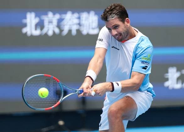 (250926) -- BEIJING, Sept. 26, 2025 -- Cameron Norrie returns a shot during the men s singles first round match between Daniil Medvedev of Russia and Cameron Norrie of Britain at 2025 China Open tennis tournament in Beijing, China, Sept. 26, 2025. (Photo by Xinhua) (SP)CHINA-BEIJING-TENNIS-CHINA OPEN-MEN S SINGLES-FIRST ROUND (CN) MaxZihan 