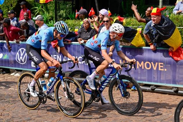 Belgian Jasper Schoofs and Belgian Aaron Dockx pictured in action during the u23 men road race (164,6 km) at the cycling road World Championships in Kigali, Rwanda, Friday 26 September 2025. The 2025 UCI Road World Championships take place from 21 to 28 September in Kigali, Rwanda. DIRKxWAEM  x135326872x