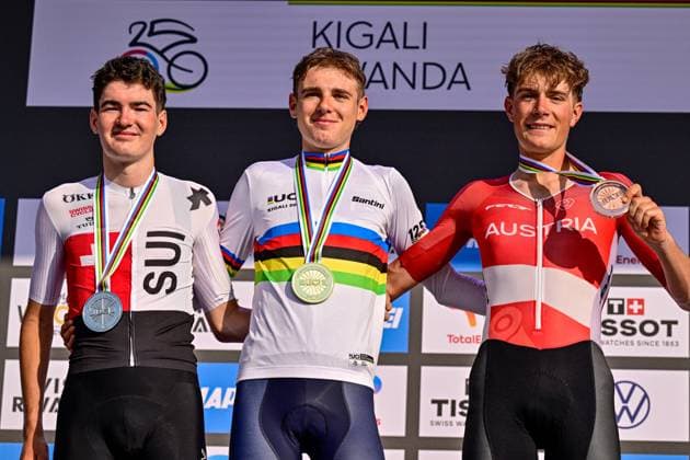 Marco Schrettl, Italian Lorenzo Finn and Jan Huber pictured on the podium after the u23 men road race (164,6 km) at the cycling road World Championships in Kigali, Rwanda, Friday 26 September 2025. The 2025 UCI Road World Championships take place from 21 to 28 September in Kigali, Rwanda. DIRKxWAEM  x135333412x