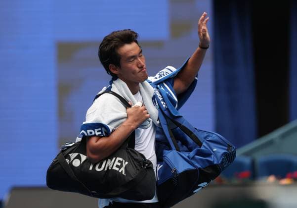(250926) -- BEIJING, Sept. 26, 2025 -- Bu Yunchaokete waves to spectators after the men s singles first round match between Bu Yunchaokete of China and Alex De Minaur of Australia at 2025 China Open tennis tournament in Beijing, China, Sept. 26, 2025. (Photo by Xinhua) (SP)CHINA-BEIJING-TENNIS-CHINA OPEN-MEN S SINGLES-FIRST ROUND (CN) MaxZihan 