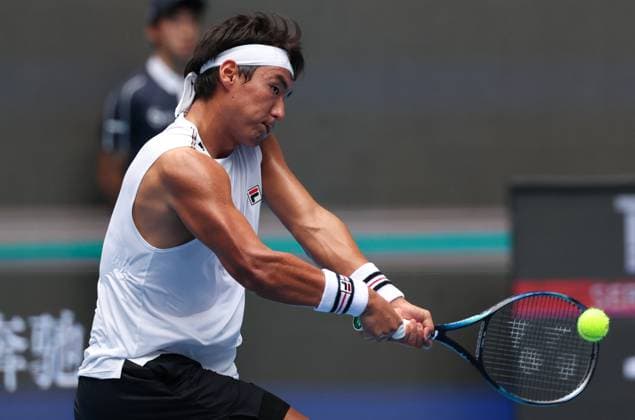 (250926) -- BEIJING, Sept. 26, 2025 -- Bu Yunchaokete returns a shot during the men s singles first round match between Bu Yunchaokete of China and Alex De Minaur of Australia at 2025 China Open tennis tournament in Beijing, China, Sept. 26, 2025. (Photo by Xinhua) (SP)CHINA-BEIJING-TENNIS-CHINA OPEN-MEN S SINGLES-FIRST ROUND (CN) MaxZihan 