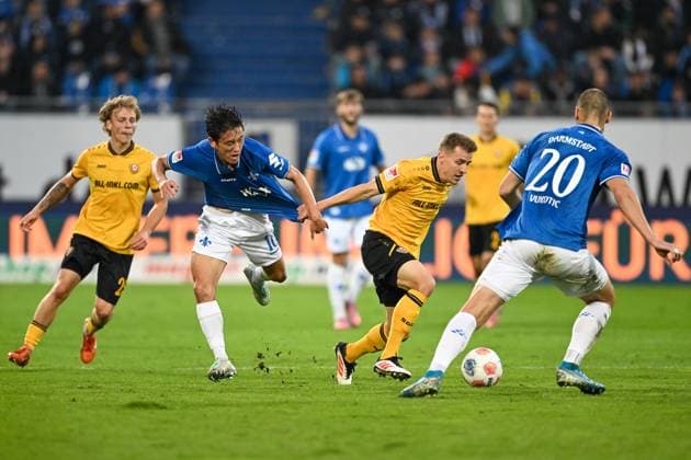 Hiroki Akiyama SV Darmstadt 1898, 16 in duel with Niklas Hauptmann Dynamo Dresden, 27 , GER, SV Darmstadt 98 vs Dynamo Dresden, Football, Bundesliga 2, Matchday 7, Season 2025 2026, 26 09 2025 DFL REGULATIONS PROHIBIT ANY USE OF PHOTOGRAPHS AS IMAGE SEQUENCES AND OR QUASI VIDEO GER, SV Darmstadt 98 vs Dynamo Dresden, Football, Bundesliga 2, Matchday 7, Season 2025 2026, 26 09 2025 Darmstadt Copyright: xEibner-Pressefoto FlorianxWiegandx EP_FWD