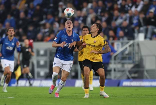 26 09 2025, xdcx, Soccer 2 Bundesliga, SV Darmstadt 98 SG Dynamo Dresden, emonline, emspor, despor, v l , Fraser Hornby SV Darmstadt 98 , Julian Pauli SG Dynamo Dresden DFL DFB REGULATIONS PROHIBIT ANY USE OF PHOTOGRAPHS AS IMAGE SEQUENCES AND OR QUASI VIDEO Copyright: HMBxMedia Claus