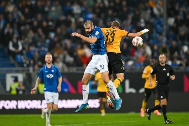Aleksandar Vukotic SV Darmstadt 1898, 20 in duel with Christoph Daferner Dynamo Dresden, 33 , GER, SV Darmstadt 98 vs Dynamo Dresden, Football, Bundesliga 2, Matchday 7, Season 2025 2026, 26 09 2025 DFL REGULATIONS PROHIBIT ANY USE OF PHOTOGRAPHS AS IMAGE SEQUENCES AND OR QUASI VIDEO GER, SV Darmstadt 98 vs Dynamo Dresden, Football, Bundesliga 2, Matchday 7, Season 2025 2026, 26 09 2025 Darmstadt Copyright: xEibner-Pressefoto FlorianxWiegandx EP_FWD