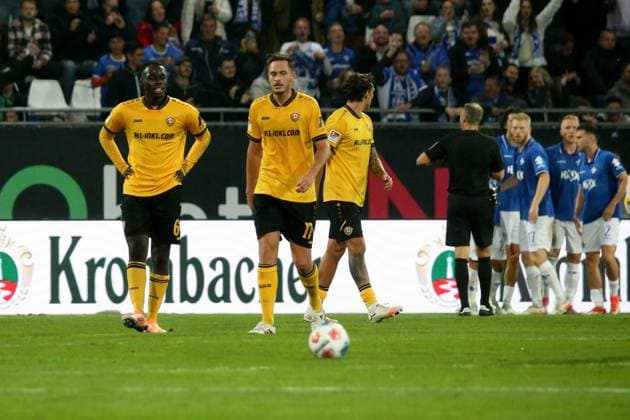26 09 2025, xpfrx, Soccer 2 Bundesliga, SV Darmstadt 98 Dynamo Dresden v l Kofi Amoako SG Dynamo Dresden Aljaz Casar SG Dynamo Dresden Julian Pauli SG Dynamo Dresden Disappointed, sad, frustrated after the goal for 1 0 DFL DFB REGULATIONS PROHIBIT ANY USE OF PHOTOGRAPHS as IMAGE SEQUENCES and or QUASI VIDEO Darmstadt