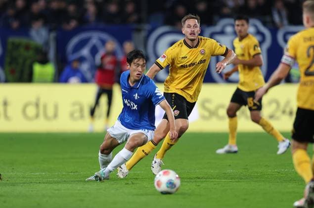 26 09 2025, xdcx, Soccer 2 Bundesliga, SV Darmstadt 98 SG Dynamo Dresden, emonline, emspor, despor, v l , Hiroki Akiyama SV Darmstadt 98 , Aljaz Casar SG Dynamo Dresden DFL DFB REGULATIONS PROHIBIT ANY USE OF PHOTOGRAPHS AS IMAGE SEQUENCES AND OR QUASI VIDEO Copyright: HMBxMedia Claus