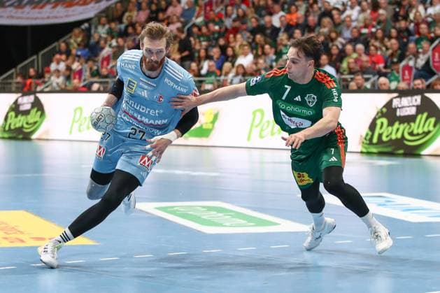 26 09 2025, xgox, Handball Daikin HBL, TSV Hannover Burgdorf HC Erlangen emspor, v l Antonio Metzner Erlangen, 27 , Leif Tissier Hannover, 7 duel, duel, fight, tackle Hannover