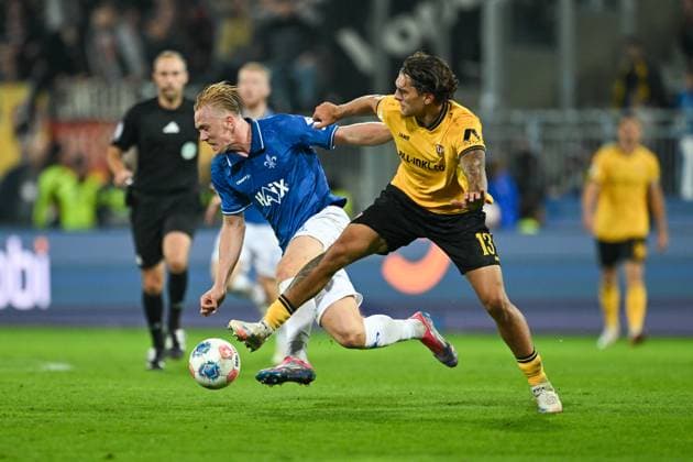Isac Lidberg SV Darmstadt 1898, 07 in duel with Julian Pauli Dynamo Dresden, 13 , GER, SV Darmstadt 98 vs Dynamo Dresden, Football, Bundesliga 2, Matchday 7, Season 2025 2026, 26 09 2025 DFL REGULATIONS PROHIBIT ANY USE OF PHOTOGRAPHS AS IMAGE SEQUENCES AND OR QUASI VIDEO GER, SV Darmstadt 98 vs Dynamo Dresden, Football, Bundesliga 2, Matchday 7, Season 2025 2026, 26 09 2025 Darmstadt Copyright: xEibner-Pressefoto FlorianxWiegandx EP_FWD