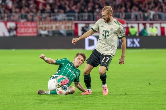 left to right Jens Stage 6 SV Werder Bremen in duel with Konrad Laimer 27 FC Bayern Muenchen , FC Bayern Muenchen vs SV Werder Bremen, DFL, Bundesliga, Saison 2025 2026, Allianz Arena, Hinrunde, 5 Spieltag, 26 09 2025 DFB regulations prohibit any use of photographs as image sequences and or quasi video Muenchen Bayern Germany Copyright: xkolbert-press MartinxAgüerax