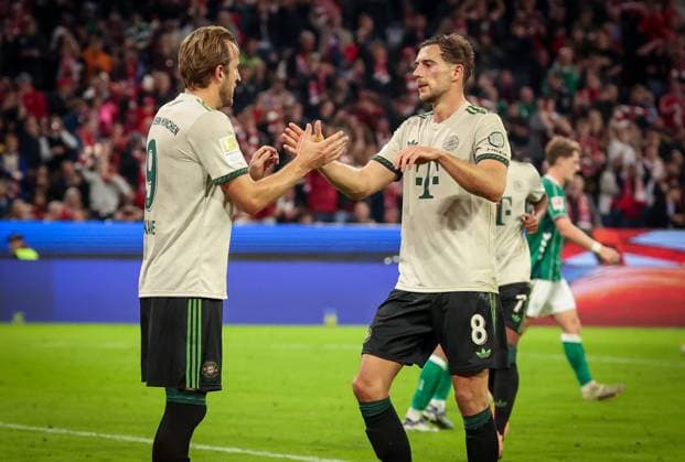 Harry Kane 9 FC Bayern Muenchen and Leon Goretzka 8 FC Bayern Muenchen , right, celebrate the 2 0, FC Bayern Muenchen vs SV Werder Bremen, DFL, Bundesliga, Saison 2025 2026, Allianz Arena, Hinrunde, 5 Spieltag, 26 09 2025 DFB regulations prohibit any use of photographs as image sequences and or quasi video Muenchen Bayern Germany Copyright: xkolbert-press MartinxAgüerax
