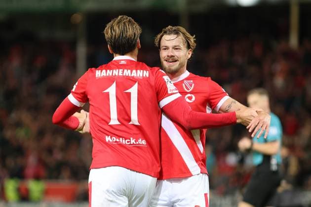 11 Moritz Hannemann Energie Cottbus, l and 3 Henry Rorig Energie Cottbus celebrate the 5 0 Football 3 League 2025 2026 FC Energie Cottbus VfB Stuttgart II