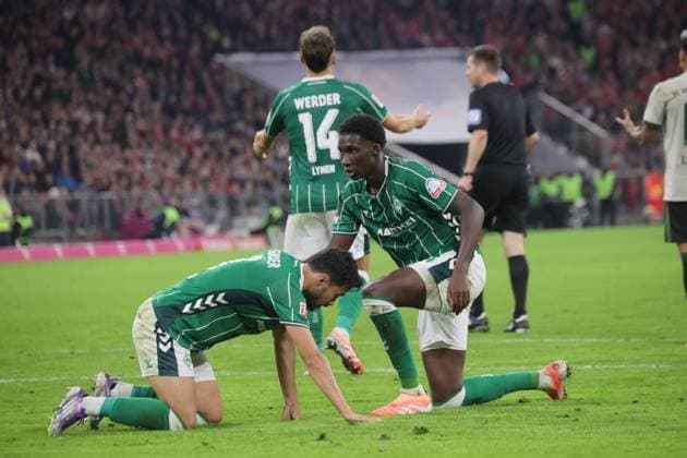 Bremens 3 SUGAWARA and Bremens 31 COULIBALY Soccer Bayern Bremen 1 Soccer Bundesliga, FC Bayern Munich SV Werder Bremen, Matchday 5, Season 2025 2026, on 26 09 2025 in Munich, A L L I A N Z A R E N A, Germany Source Copyright Credit Oryk HAIST xFUSSBALL-BAYERN-BREMENx