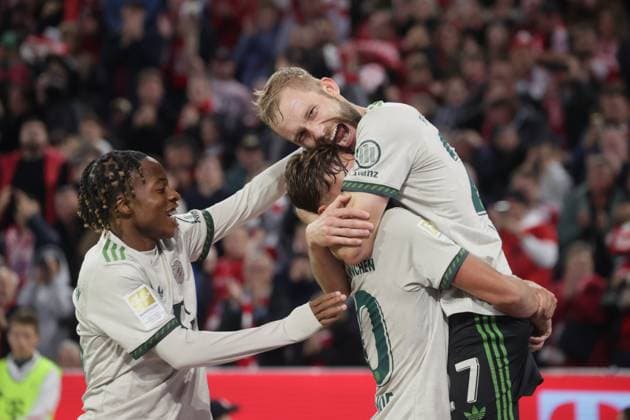 Bayerns Wisdom MIKE, Bayerns goal scorer 27 Konrad LAIMER and WISDOM after scoring 4 0 Soccer Bayern Bremen 1 Soccer Bundesliga, FC Bayern Munich SV Werder Bremen, Matchday 5, Season 2025 2026, on 26 09 2025 in Munich, A L L I A N Z A R E N A, Germany Source Copyright Credit Oryk HAIST xFUSSBALL-BAYERN-BREMENx