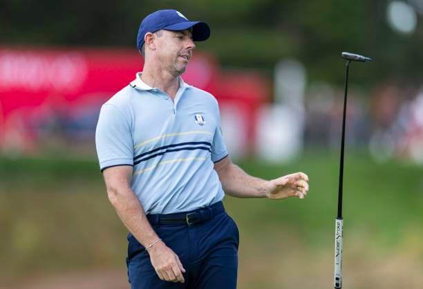 Rory McIlroy of Team Europe reacts after missing a putt on the fourteenth green during a four-ball match against Team United States on day one of the 45th Ryder Cup at the Bethpage Black Course in Farmingdale, New York on Friday, September 26, 2025. Europe has a 5.5 to 2.5 lead over the United States after the first day.  RYD20250926863 COREYxSIPKIN