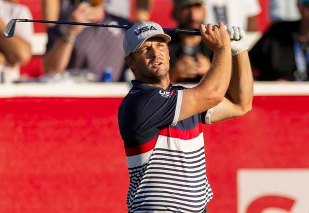 Bryson DeChambeau of Team United States tees off on the seventeenth hole during a four-ball match against Team Europe on day one of the 45th Ryder Cup at the Bethpage Black Course in Farmingdale, New York on Friday, September 26, 2025. Europe has a 5.5 to 2.5 lead over the United States after the first day.  RYD20250926875 COREYxSIPKIN