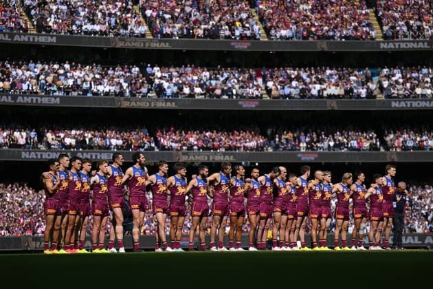 2025 AFL GRAND FINAL, Brisbane Lions players line up for the national anthem during the AFL Grand Final between the Geelong Cats and the Brisbane Lions at the Melbourne Cricket Ground in Melbourne, Saturday, September 27, 2025. ( NO ARCHIVING, EDITORIAL USE ONLY MELBOURNE VICTORIA AUSTRALIA  Copyright: xJAMESxROSSx 20250927124023279074