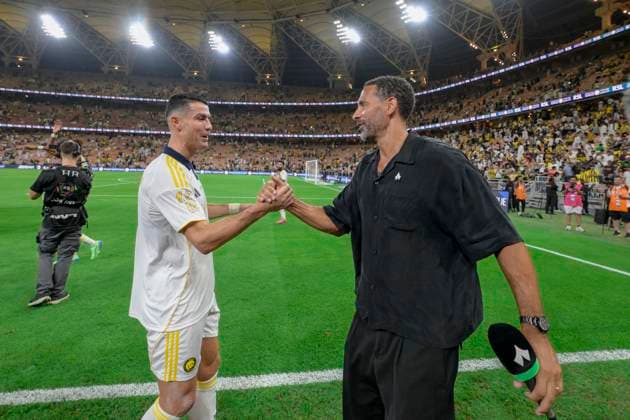 JEDDAH, SAUDI ARABIA - SEPTEMBER 26: Cristiano Ronaldo meets Rio Ferdinand after the Saudi Pro League match between Al Ittihad and Al Nassr at King Abdullah Sports City on September 26, 2025 in Jeddah, Saudi Arabia. (Photo by Khalid Alhaj) SPO  Copyright: xKhalidxAlhaj
