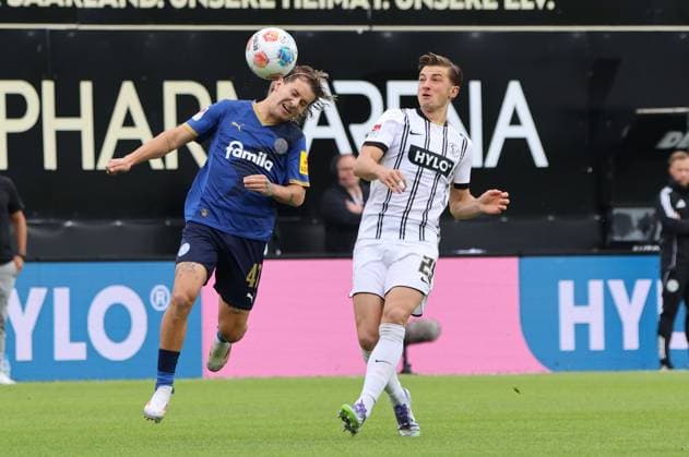 27 09 2025, Football, Men, 2 Bundesliga, Season 2025 2026, SV 07 Elversberg Holstein Kiel, Lukas Petkov SV 07 Elversberg , John Tolkin Holstein Kiel Elversberg Ursapharm Arena an der Kaiserlinde Saarland Germany DEU Copyright: xSebastianxBachx