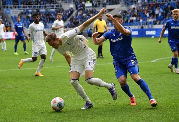 27 09 2025, xhbx, Soccer 2 Bundesliga, Karlsruher SC 1 FC Magdeburg v l Maximilian Breunig 1 FC Magdeburg , Nicolai Rapp Karlsruher SC KSC DFL DFB REGULATIONS PROHIBIT ANY USE OF PHOTOGRAPHS as IMAGE SEQUENCES and or QUASI VIDEO Karlsruhe