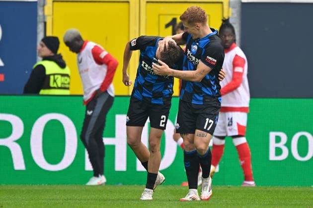 Paderborn, Home Deluxe Arena, 27 09 25, GER, Men, 2 Bundesliga, Season 2025 2026, SC Paderborn 07 1 FC Kaiserslautern Picture Laurin CURDA Paderborn cheers after his goal to 2 0 with Ruben MUELLER Paderborn DFL regulations prohibit any use of photographs as image sequences and or quasi video NRW Germany