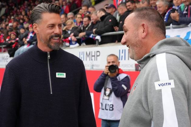 Bundesliga Men, Matchday 5, Season 2025 26, FC Heidenheim FC Augsburg Frank Schmidt Head Coach, FC Heidenheim , Sandr Wagner Head Coach, FC Augsburg FC Heidenheim FC Augsburg Bundesliga Men, Matchday 5, Season 2025 26, FC Heidenheim FC Augsburg Germany, Heidenheim, Voith Arena, 27 09 2025 SP_GHR