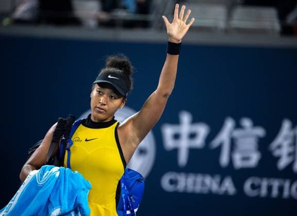 (250927) -- BEIJING, Sept. 27, 2025 -- Osaka Naomi reacts after the women s singles second round match between Osaka Naomi of Japan and Aliaksandra Sasnovich of Belarus at 2025 China Open tennis tournament in Beijing, China, Sept. 27, 2025. ) (SP)CHINA-BEIJING-TENNIS-CHINA OPEN-WOMEN S SINGLES-SECOND ROUND (CN) HuxJingwen 