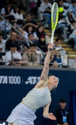 (250927) -- BEIJING, Sept. 27, 2025 -- Aliaksandra Sasnovich serves during the women s singles second round match between Osaka Naomi of Japan and Aliaksandra Sasnovich of Belarus at 2025 China Open tennis tournament in Beijing, China, Sept. 27, 2025. ) (SP)CHINA-BEIJING-TENNIS-CHINA OPEN-WOMEN S SINGLES-SECOND ROUND (CN) HuxJingwen 