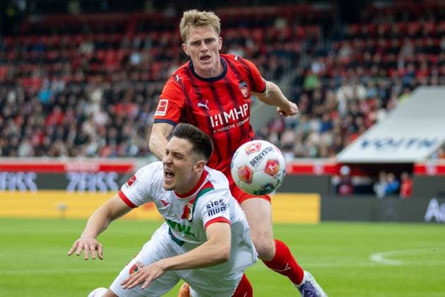 Keven Schlotterbeck FC Augsburg, 31 , Mikkel Kaufmann FC Heidenheim, 29 , GER, 1 FC Heidenheim vs FC Augsburg, Football, Bundesliga, Matchday 5, Season 2025 2026, 27 09 2025, DFL DFB REGULATIONS PROHIBIT ANY USE OF PHOTOGRAPHS AS IMAGE SEQUENCES AND OR QUASI VIDEO, GER, 1 FC Heidenheim vs FC Augsburg, Football, Bundesliga, Matchday 5, Season 2025 2026, 27 09 2025 Heidenheim Copyright: xEibner-Pressefotox EP_EER