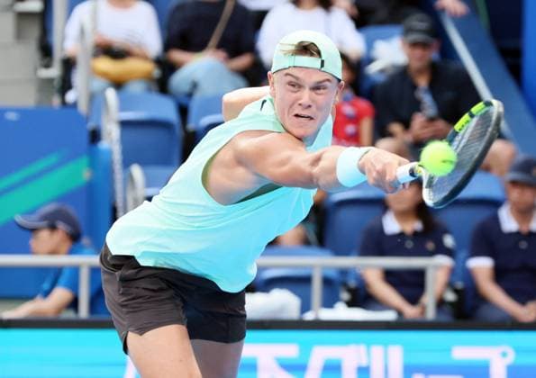 September 27, 2025, Tokyo, Japan - Holger Rune of Denmark returns the ball against Ethan Quinn of the United States during a second round match of the Japan Open Tennis tournament in Tokyo on Saturday, September 27, 2025. Rune defeated Quinn 6-4, 6-2. (photo by Yoshio Tsunoda AFLO) Noxthirdxpartyxsales  aflo_304943115