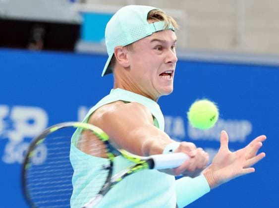 September 27, 2025, Tokyo, Japan - Holger Rune of Denmark returns the ball against Ethan Quinn of the United States during a second round match of the Japan Open Tennis tournament in Tokyo on Saturday, September 27, 2025. Rune defeated Quinn 6-4, 6-2. (photo by Yoshio Tsunoda AFLO) Noxthirdxpartyxsales  aflo_304943119