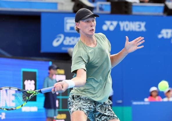 September 27, 2025, Tokyo, Japan - Ethan Quinn of the United States returns the ball against Holger Rune of Denmark during a second round match of the Japan Open Tennis tournament in Tokyo on Saturday, September 27, 2025. Rune defeated Quinn 6-4, 6-2. (photo by Yoshio Tsunoda AFLO) Noxthirdxpartyxsales  aflo_304943128