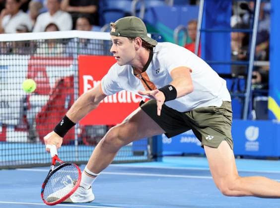 September 27, 2025, Tokyo, Japan - Zizou Bergs of Belgium returns the ball against Carlos Alcaraz of Spain during a second round match of the Japan Open Tennis tournament in Tokyo on Saturday, September 27, 2025. Alcaraz defeated Bergs 6-4, 6-3. (photo by Yoshio Tsunoda AFLO) Noxthirdxpartyxsales  aflo_304949852